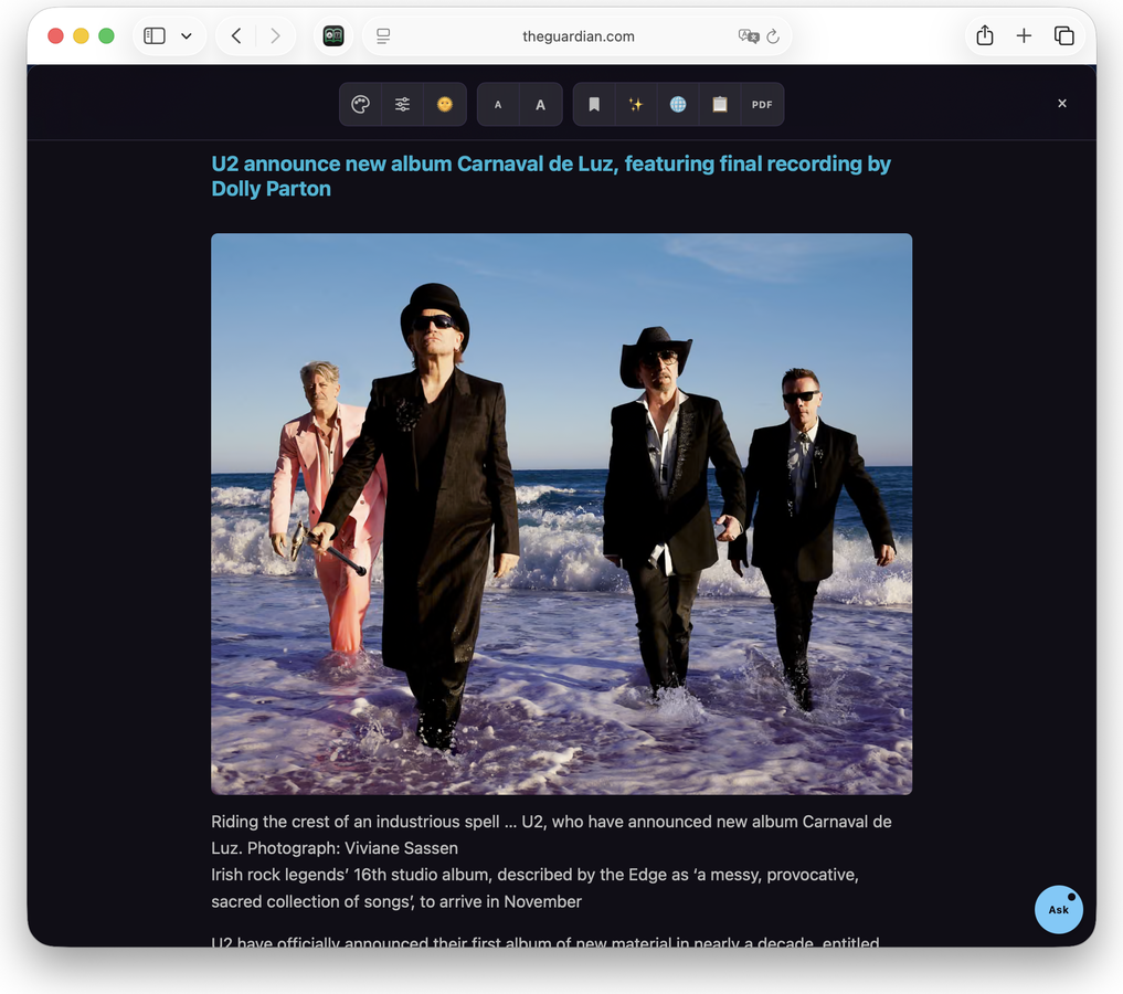 A Guardian article in the AreaderZ reader on a Mac, Midnight theme: a near-black page, light grey text and a cyan headline.